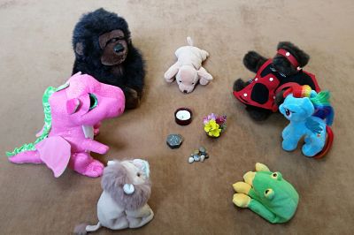 Group of stuffed animals sitting in a circle